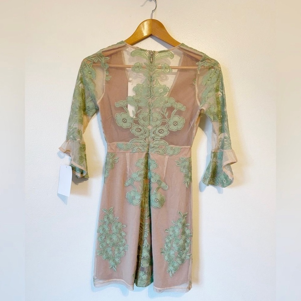 Free People For Love and Lemons Temecula
Embroidered Mesh V Neck Mini Dr… - Picture 3 of 4